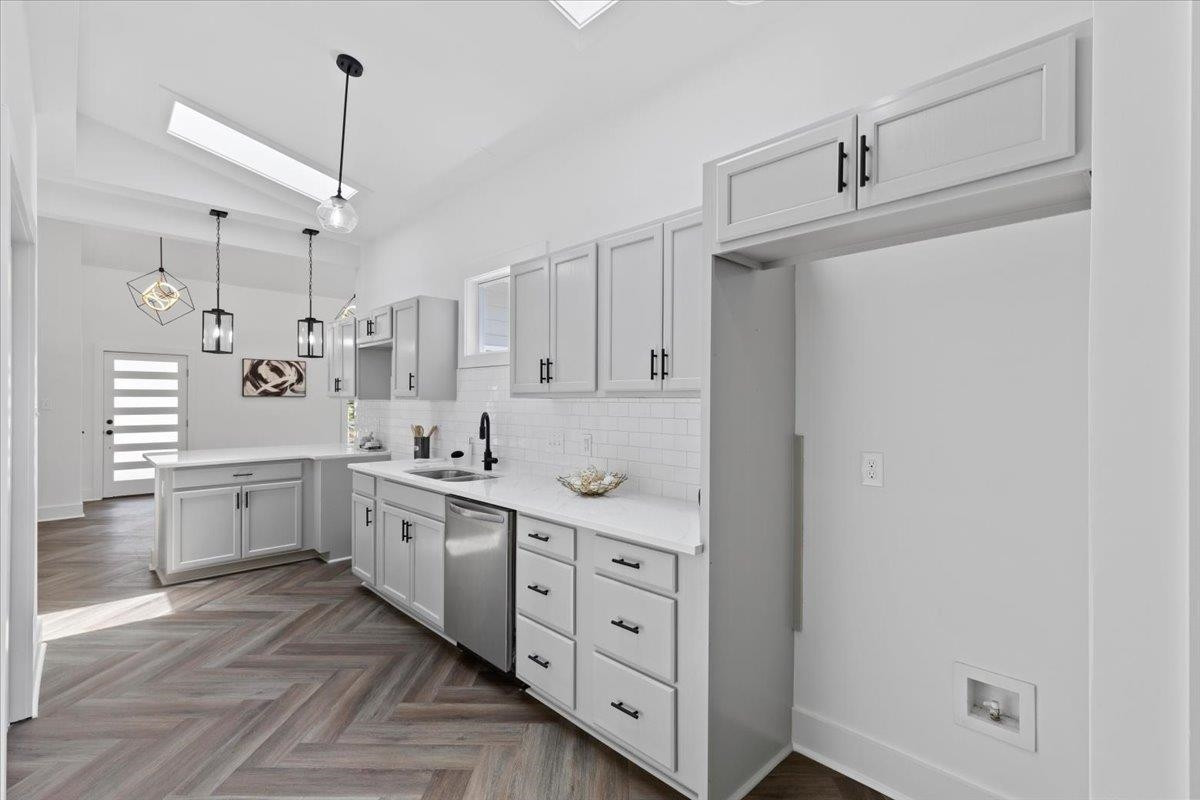 1506 Chapel Hill Road Durham, NC 27701 - Photo 18 of 50 a large white kitchen with cabinets
