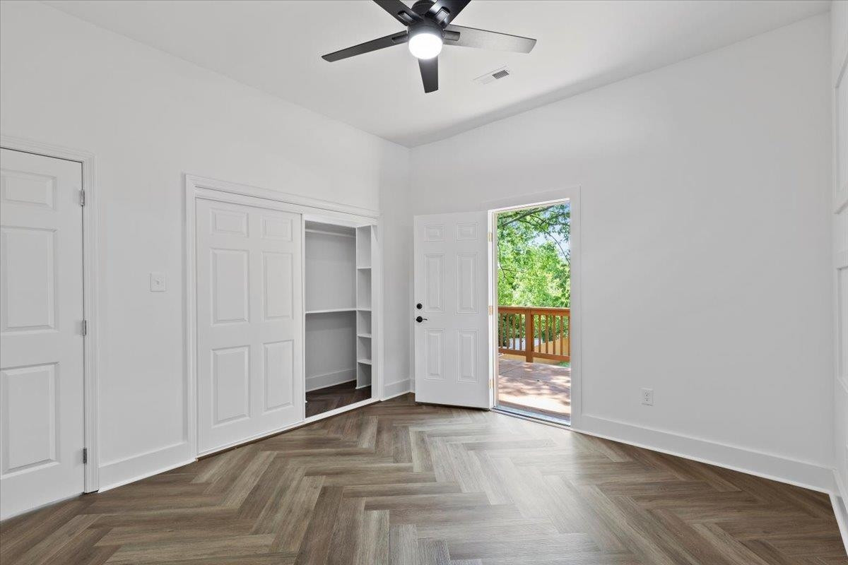 1506 Chapel Hill Road Durham, NC 27701 - Photo 20 of 50 wooden floor in an empty room with a window