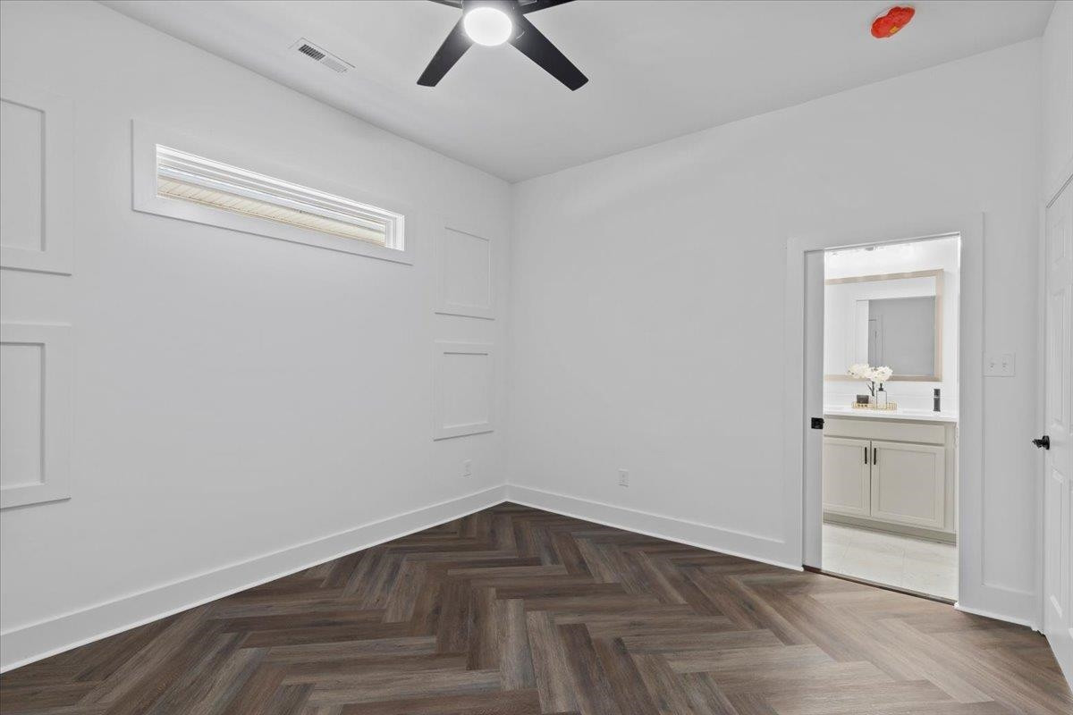 1506 Chapel Hill Road Durham, NC 27701 - Photo 22 of 50 an empty room with wooden floor and window