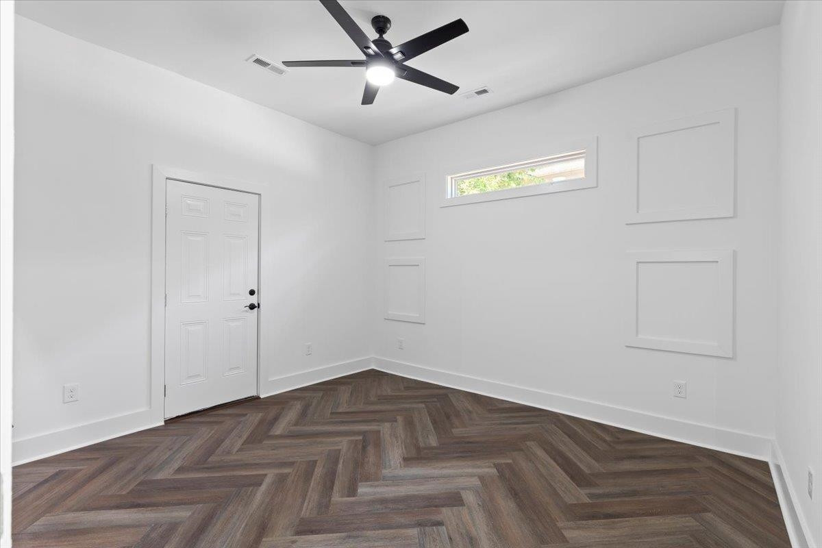 1506 Chapel Hill Road Durham, NC 27701 - Photo 23 of 50 a view of empty room with wooden floor