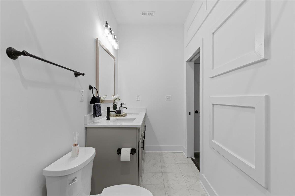 1506 Chapel Hill Road Durham, NC 27701 - Photo 25 of 50 a bathroom with a sink toilet and shower
