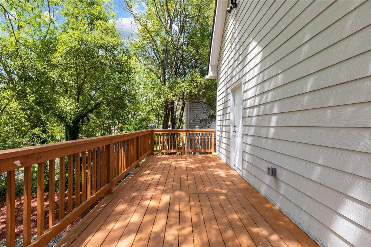 1506 Chapel Hill Road Durham, NC 27701 - Photo 38 of 50 a view of balcony with wooden floor and fence