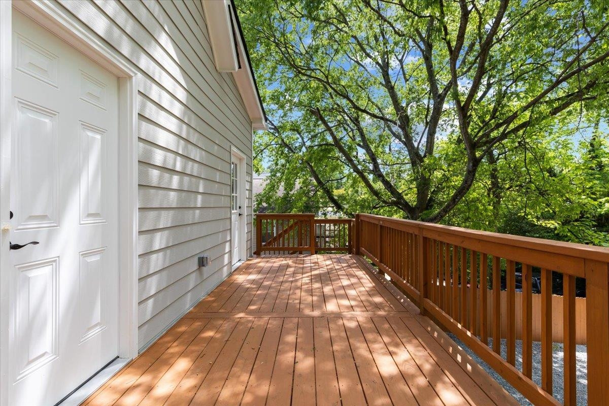 1506 Chapel Hill Road Durham, NC 27701 - Photo 39 of 50 a view of balcony with wooden floor and fence