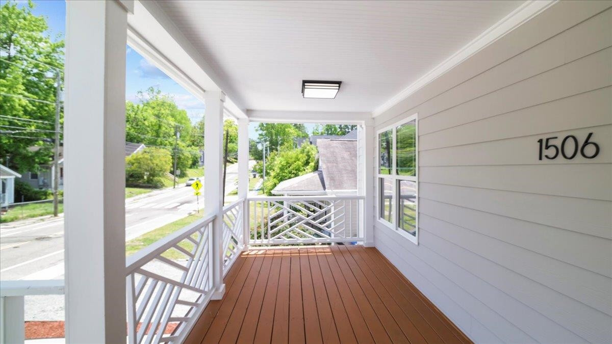 1506 Chapel Hill Road Durham, NC 27701 - Photo 4 of 50 a view of balcony with wooden floor
