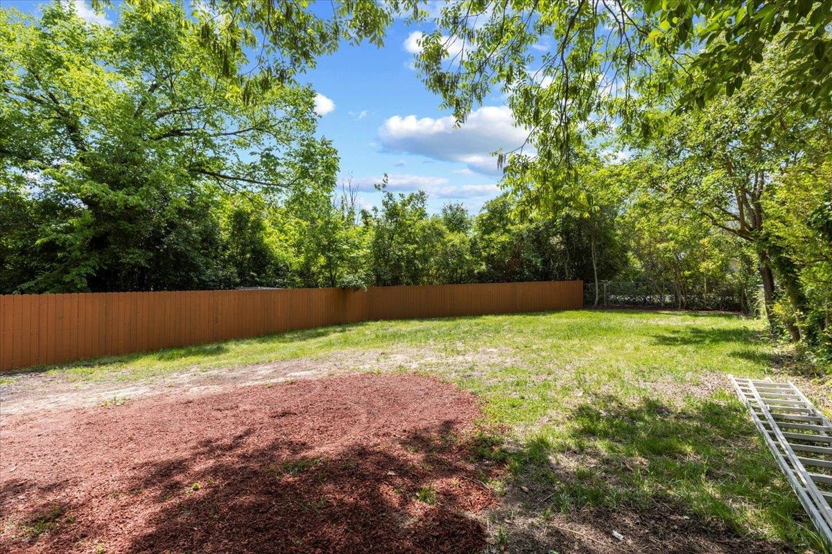 1506 Chapel Hill Road Durham, NC 27701 - Photo 49 of 50 a view of outdoor space with deck and yard