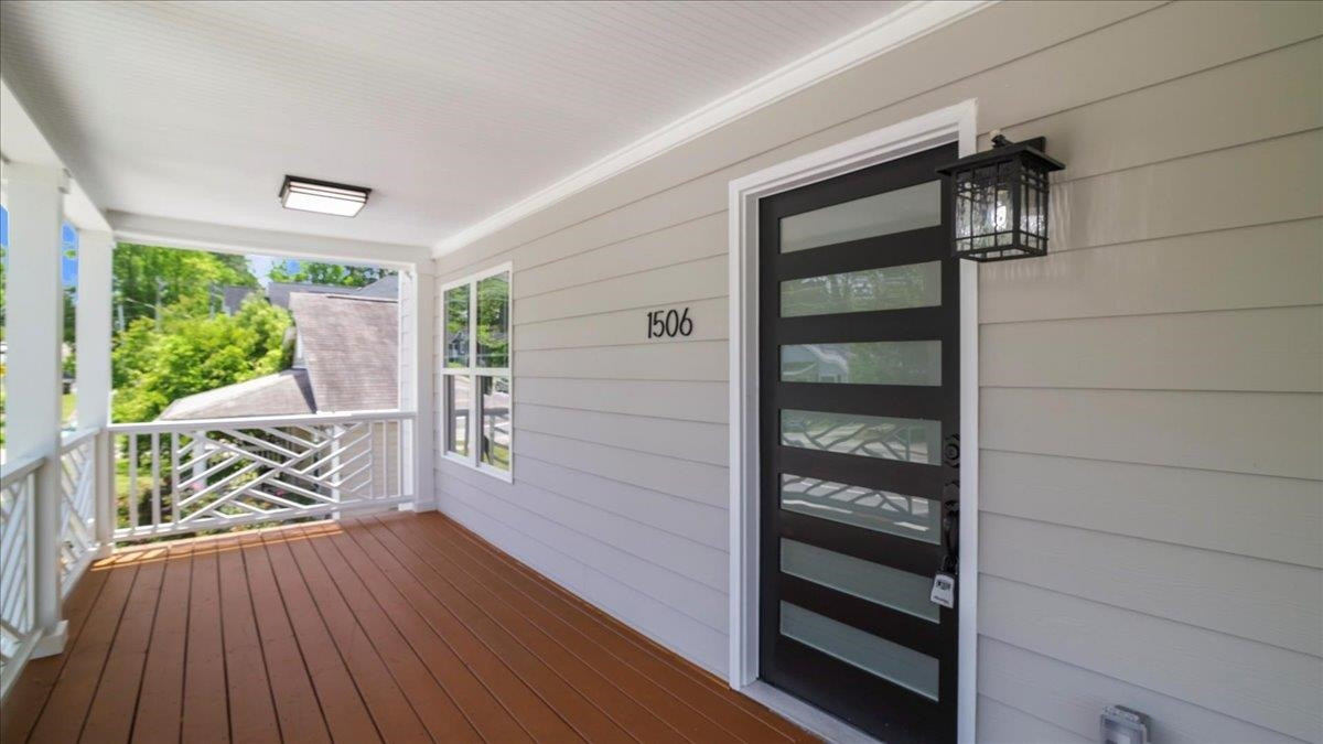 1506 Chapel Hill Road Durham, NC 27701 - Photo 6 of 50 a view of front door deck and wooden floor