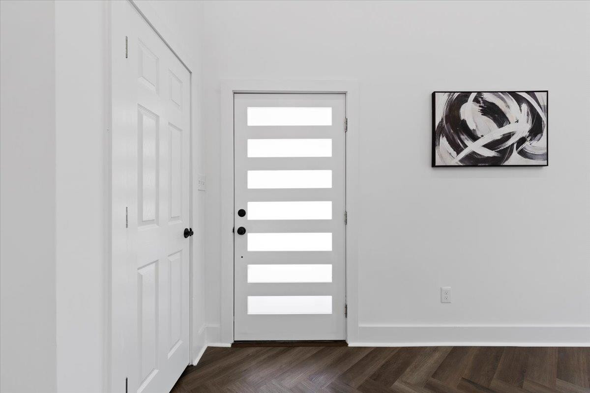 1506 Chapel Hill Road Durham, NC 27701 - Photo 7 of 50 a view of a hallway with wooden floor and closet