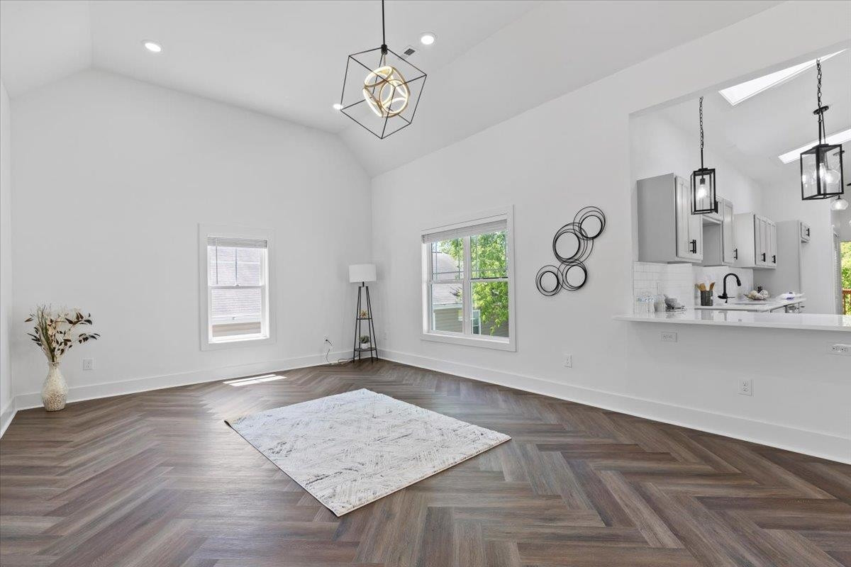 1506 Chapel Hill Road Durham, NC 27701 - Photo 9 of 50 a view of an empty room with a window and wooden floor