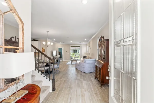 a lobby with furniture and rug