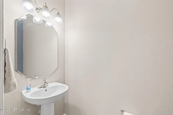 a living room with furniture window and wooden floor