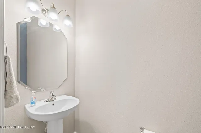 a living room with furniture window and wooden floor