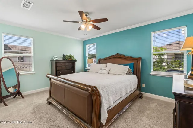 a bathroom with a double vanity sink mirror and double