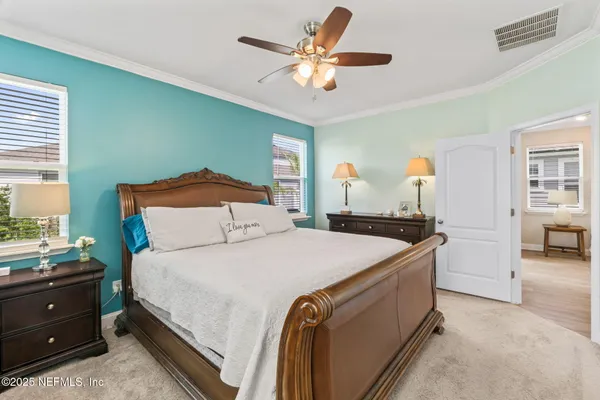 a bathroom with a shower sink and mirror