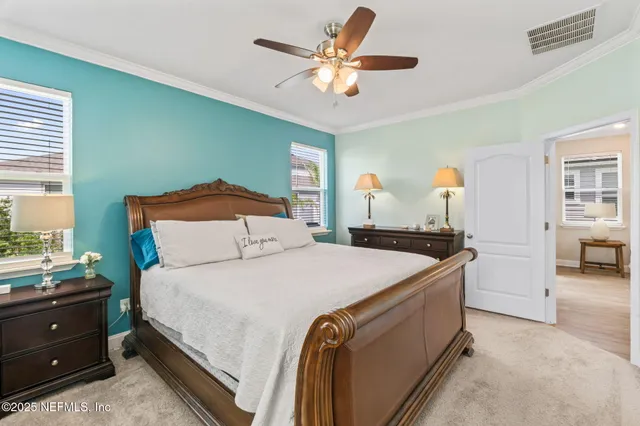 a bathroom with a shower sink and mirror