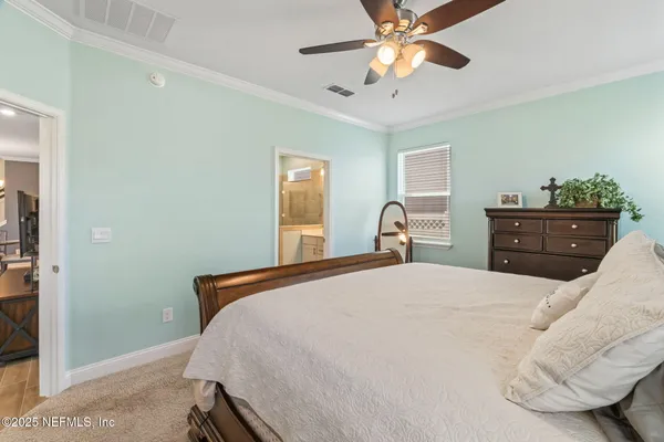 a view of a hallway with seating area