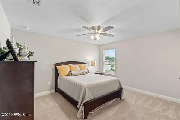 a bathroom with a sink toilet and mirror