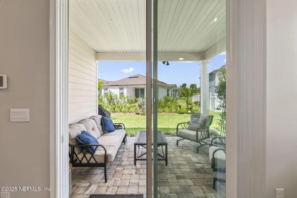 a view of a house with a back yard