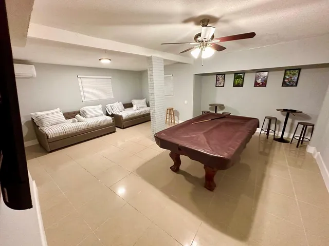 a living room with furniture and a table