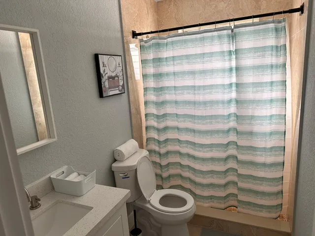 a view of a workspace with furniture