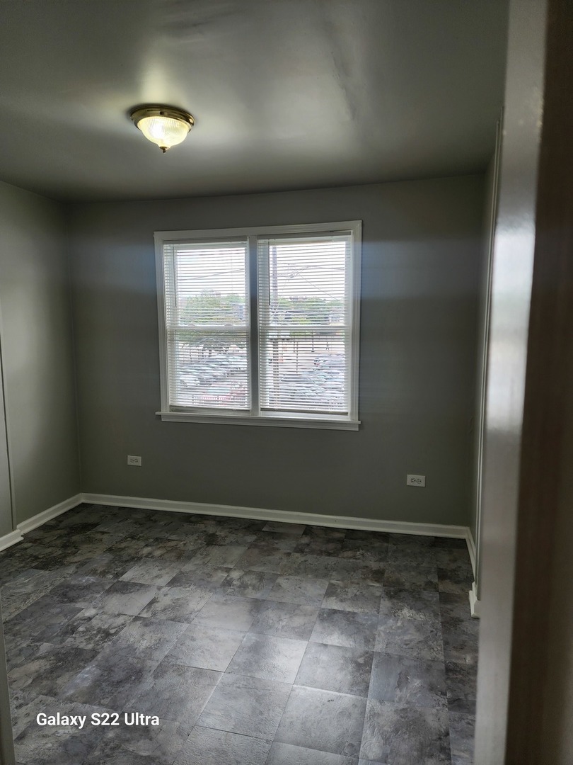 7823 South Evans Avenue, Unit 2 Chicago, IL 60619 - Photo 12 of 13 a view of room with window
