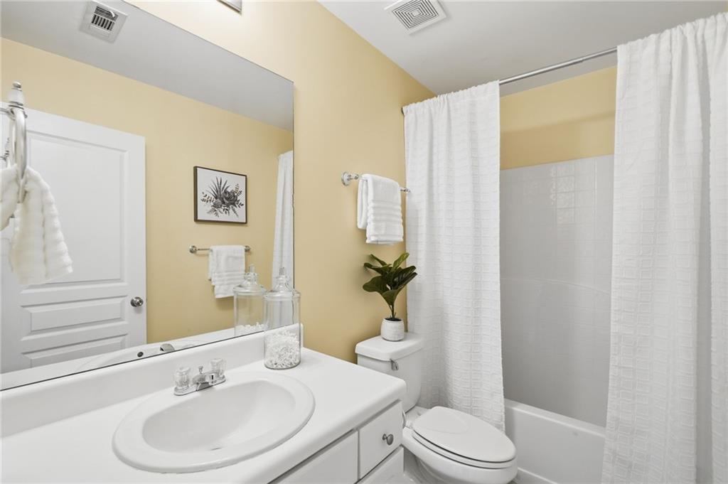 3801 Thayer Trace Duluth, GA 30096 - Photo 33 of 52 a bathroom with a sink toilet and shower