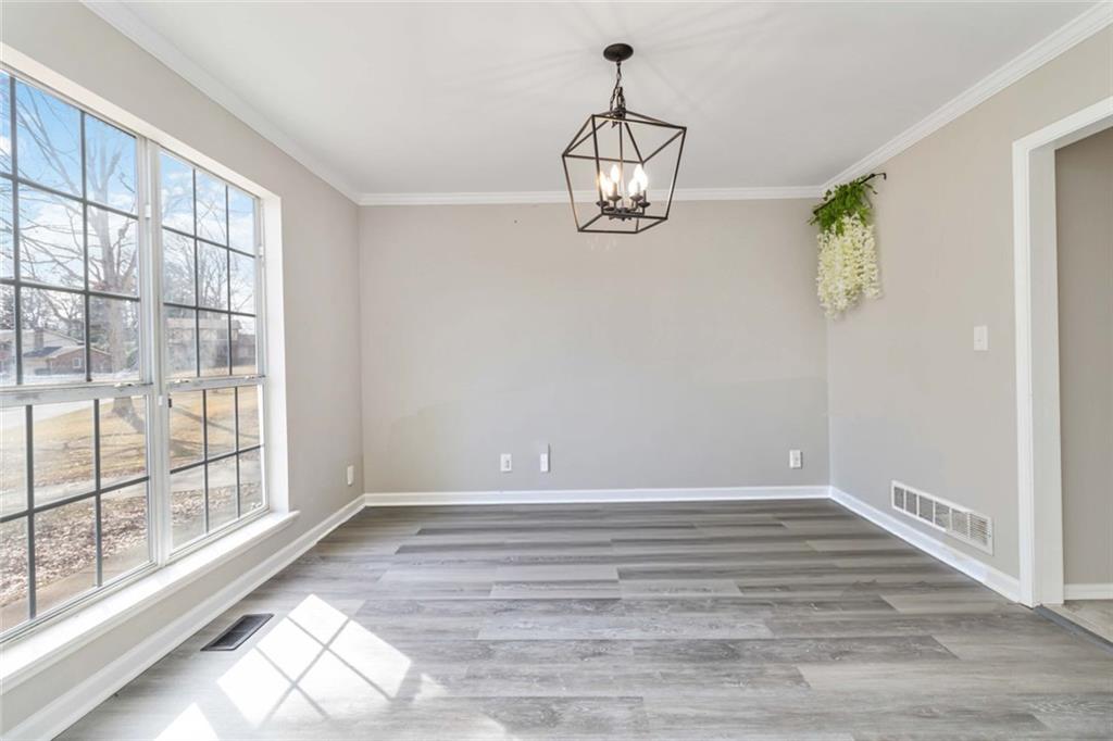 2119 Tudor Castle Way Decatur, GA 30035 - Photo 21 of 35 a view of empty room with wooden floor and fan
