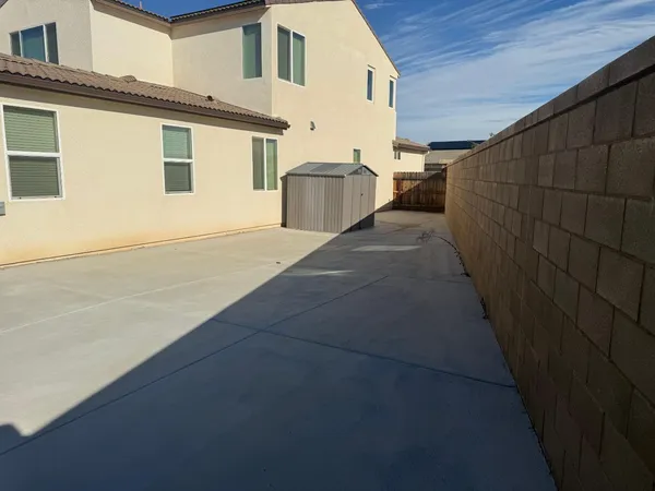a view of a back yard of the house