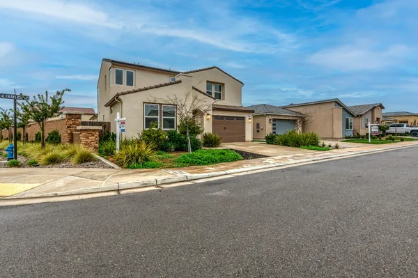 front view of a house with a street