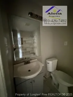 a view of a sign board and yard