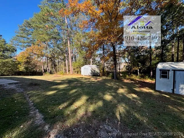 a view of outdoor space and yard