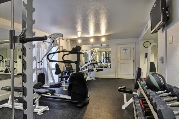 a view of a room with gym equipment