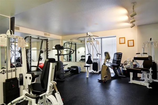 a view of a room with gym equipment