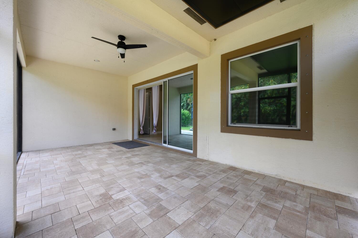 8024 Southwest Marin Drive Stuart, FL 34997 - Photo 19 of 26 a view of an empty room with a window