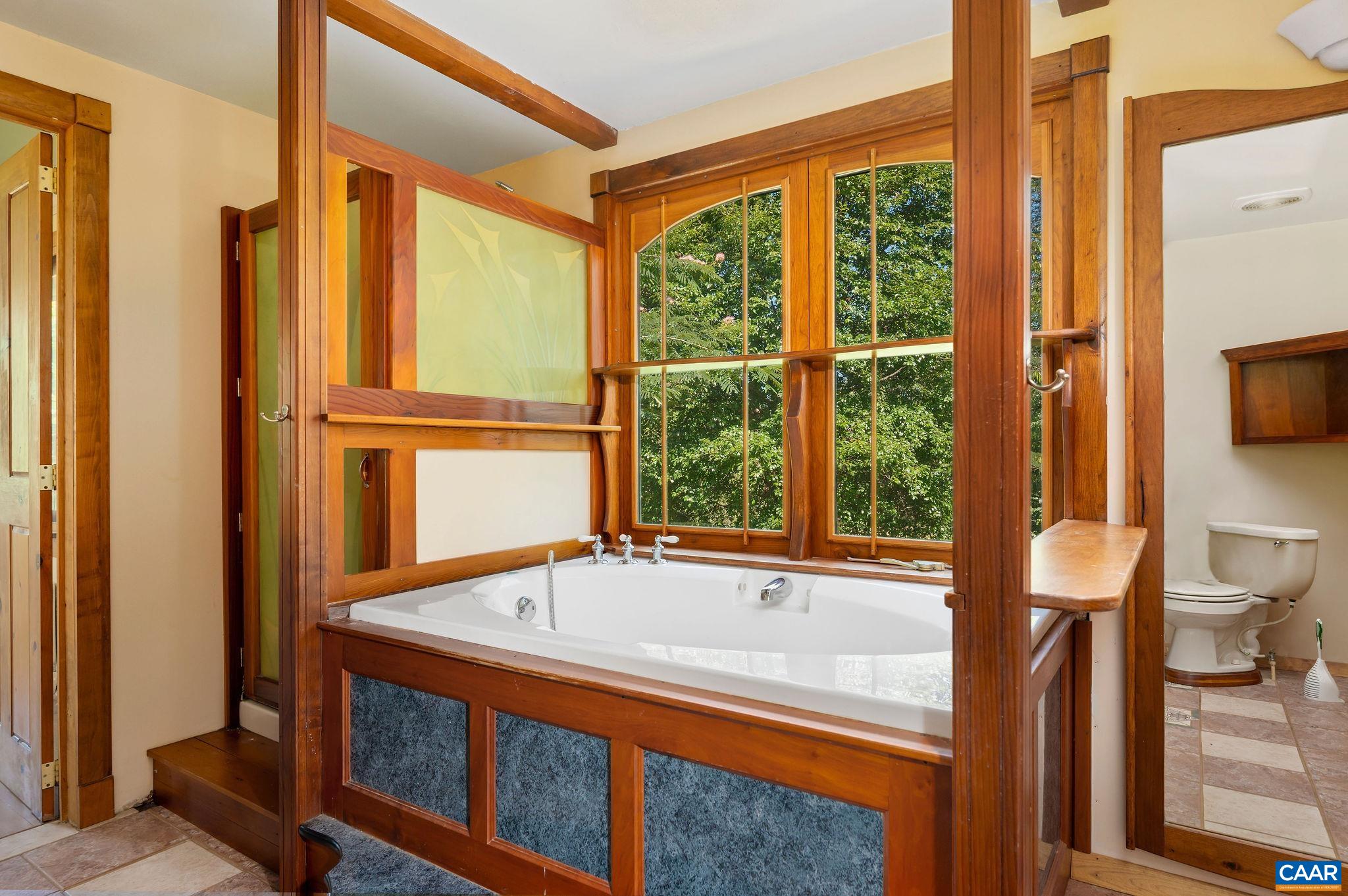 6265 Midway Road Charlottesville, VA 22903 - Photo 11 of 68 a bathroom with a tub and a sink
