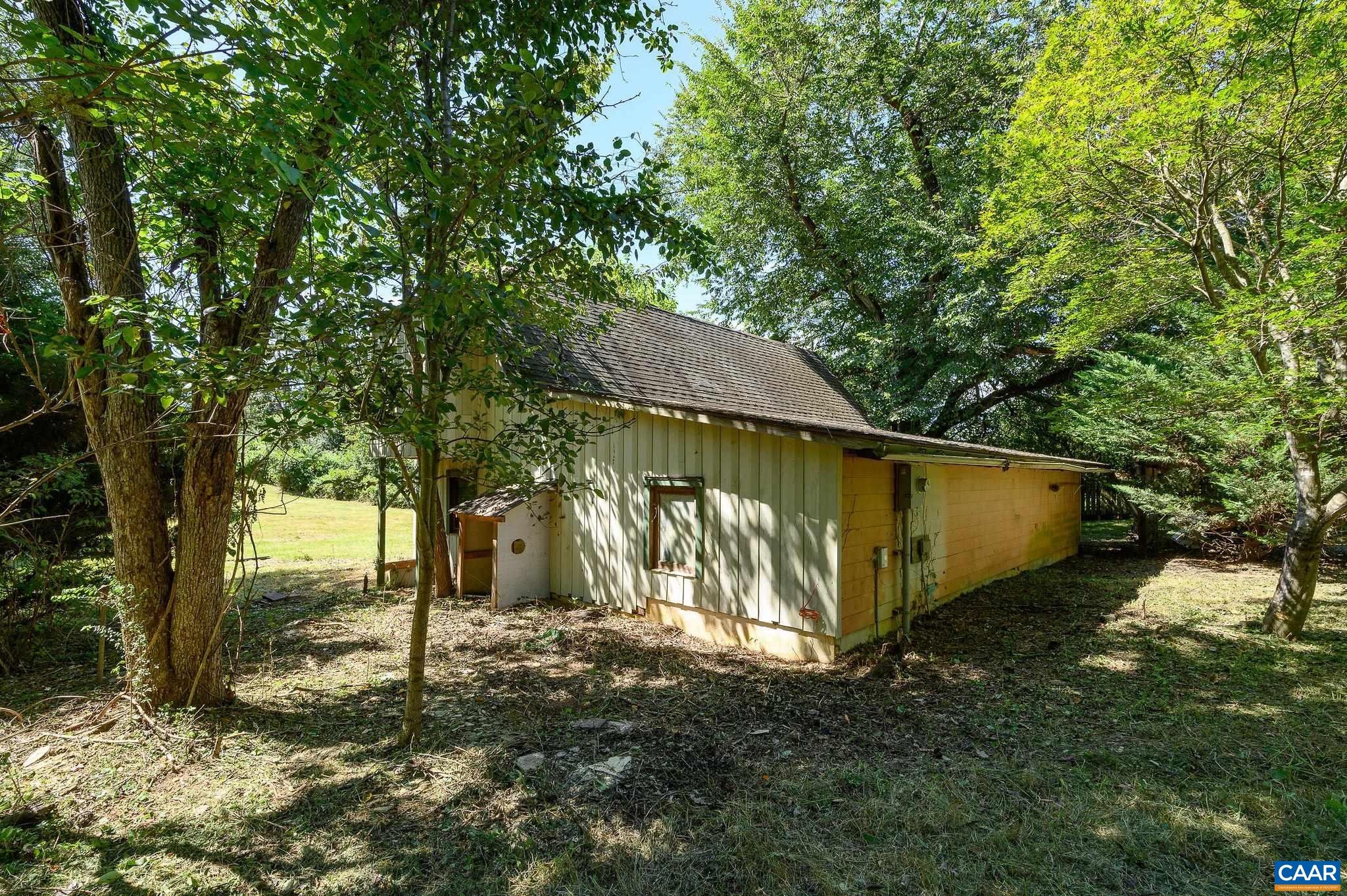 6265 Midway Road Charlottesville, VA 22903 - Photo 38 of 68 a view of a yard with a tree