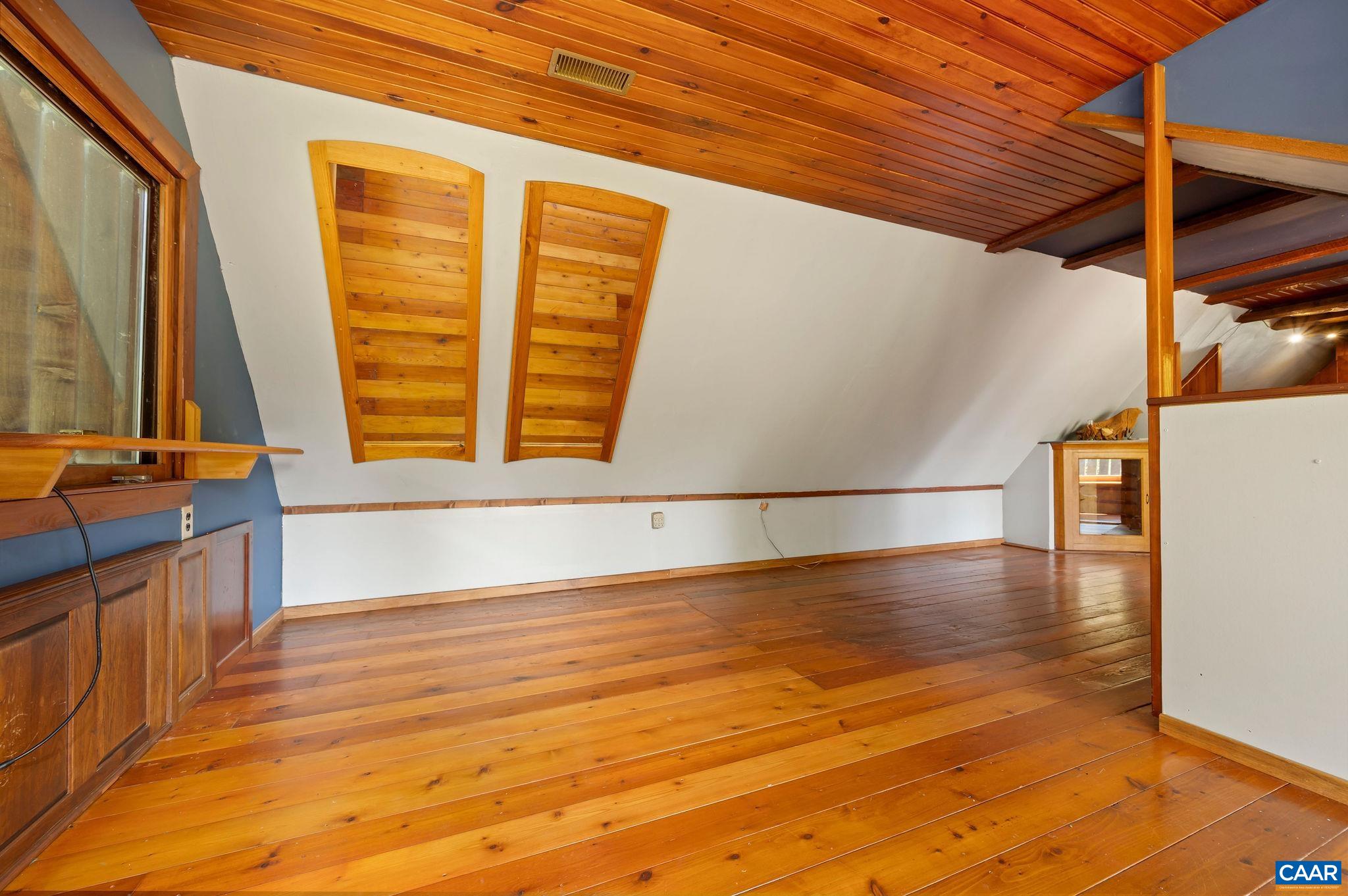 6265 Midway Road Charlottesville, VA 22903 - Photo 48 of 68 a view of a room with wooden floor and windows