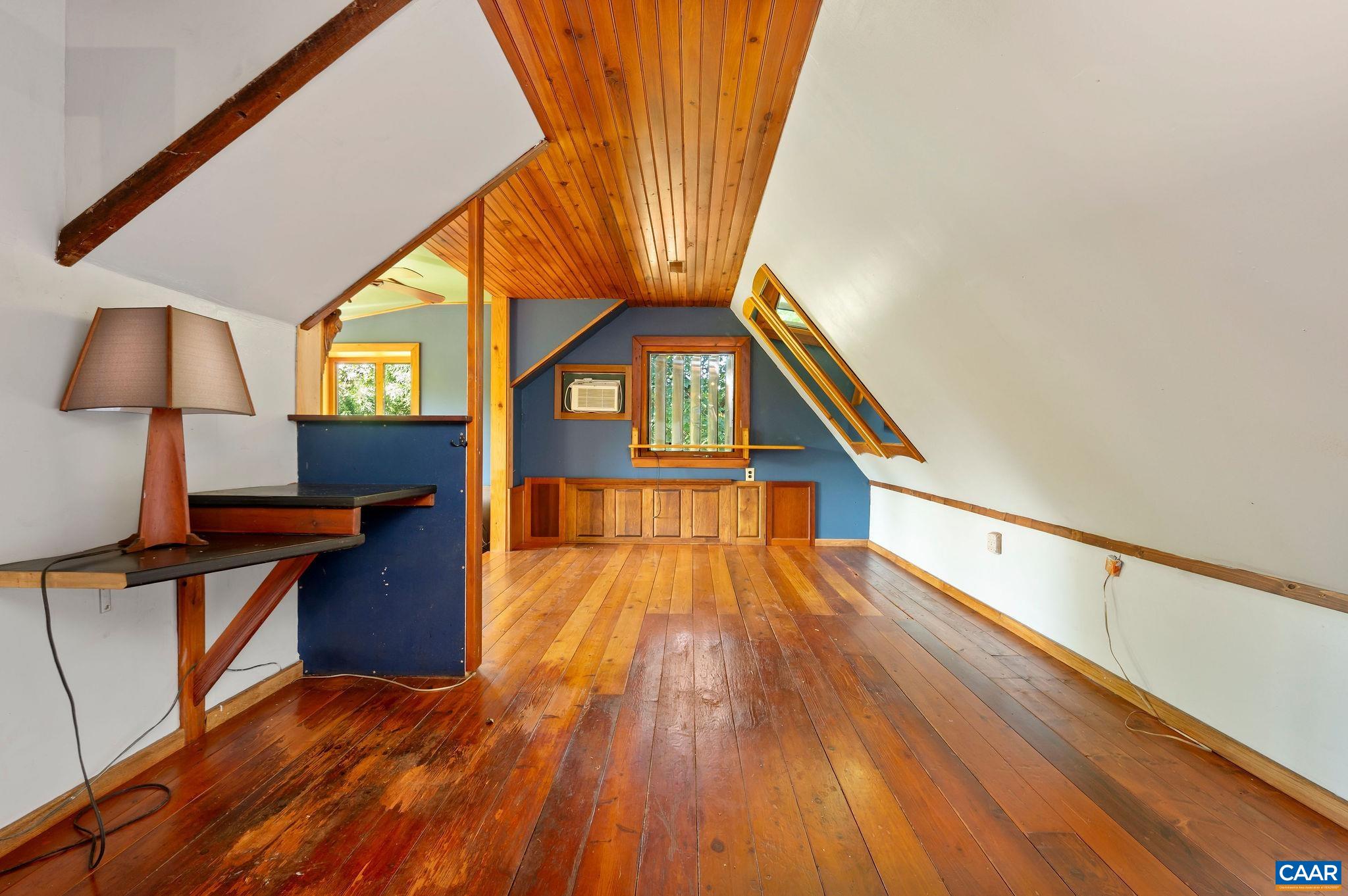6265 Midway Road Charlottesville, VA 22903 - Photo 49 of 68 a view of living room with wooden floor and a large window