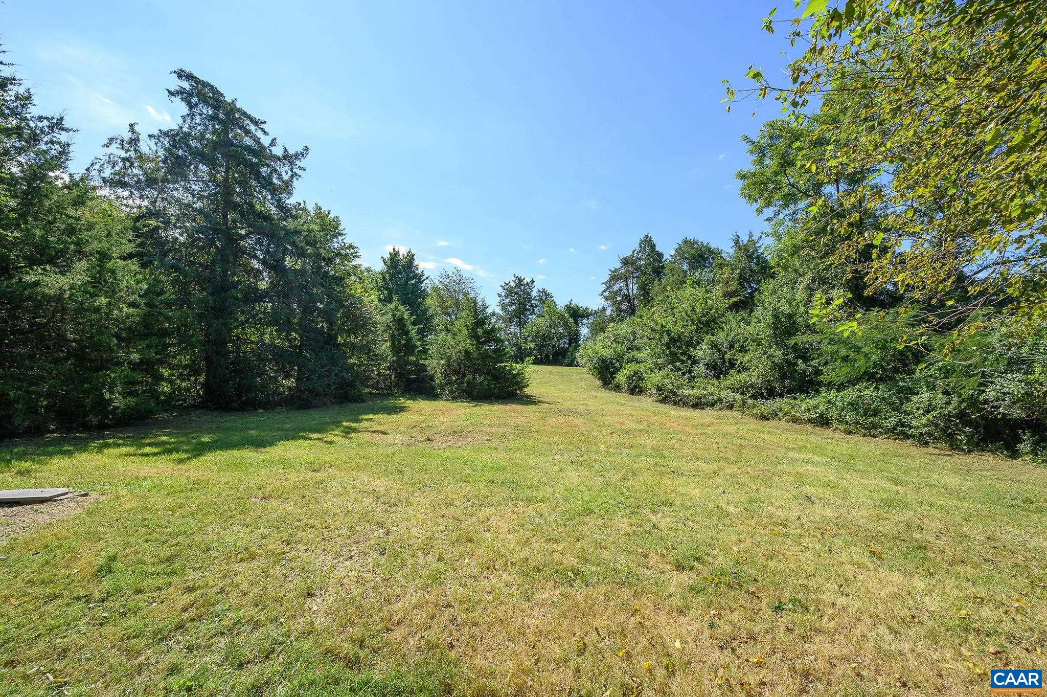 6265 Midway Road Charlottesville, VA 22903 - Photo 61 of 68 a view of a field with trees in the background