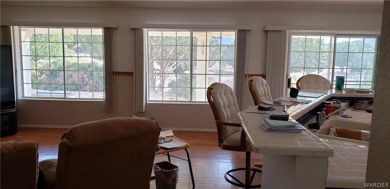10002 East Blake Ranch Road, Unit 3 Kingman, AZ 86401 - Photo 11 of 42 a view of a workspace with furniture and a window