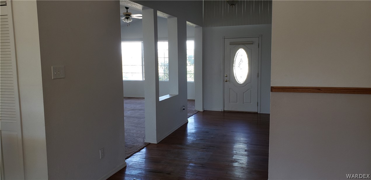 10002 East Blake Ranch Road, Unit 3 Kingman, AZ 86401 - Photo 3 of 42 a view of gallery with wooden floor