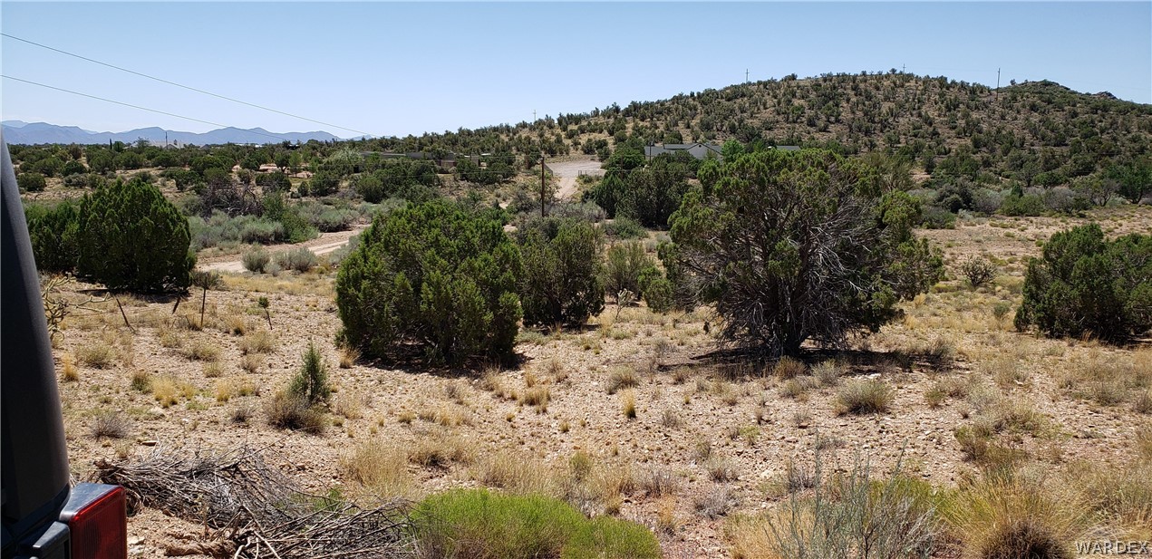 10002 East Blake Ranch Road, Unit 3 Kingman, AZ 86401 - Photo 40 of 42 a view of a yard covered with snow