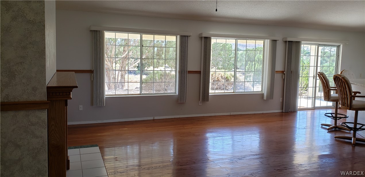 10002 East Blake Ranch Road, Unit 3 Kingman, AZ 86401 - Photo 5 of 42 a view of livingroom with hardwood floor and a window