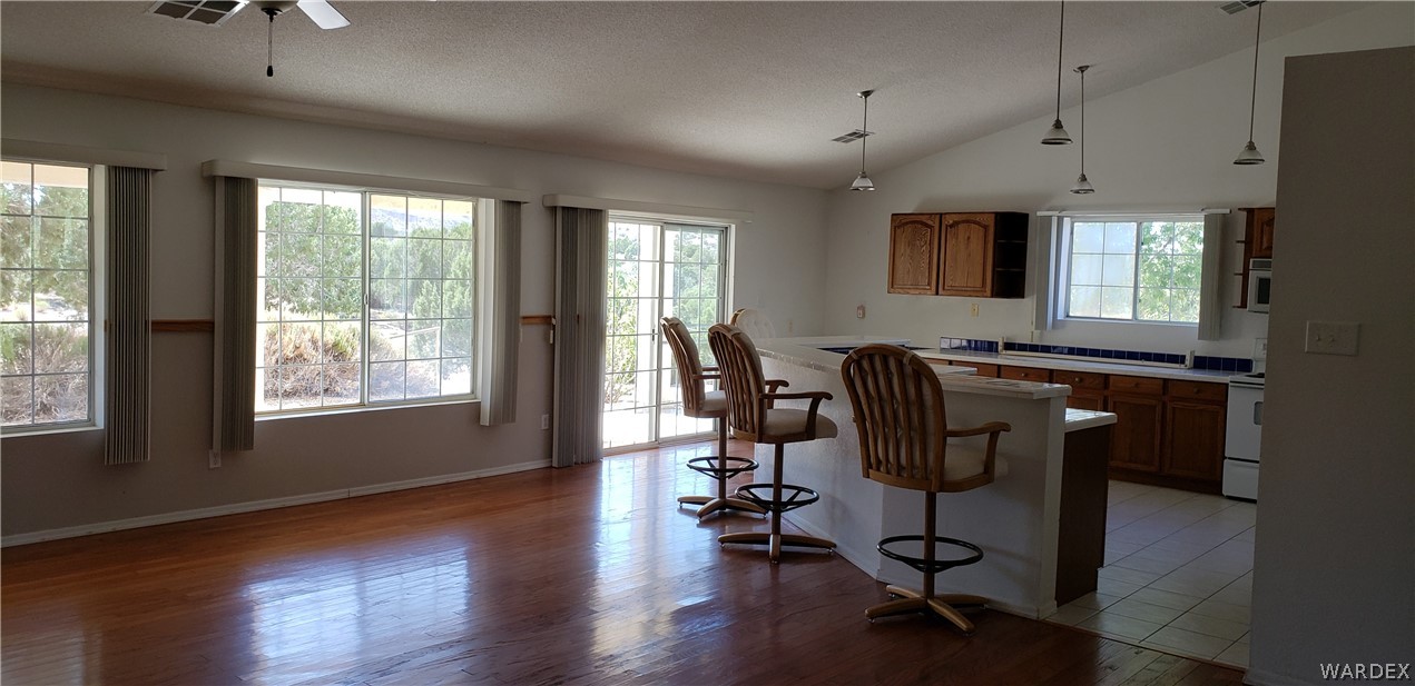 10002 East Blake Ranch Road, Unit 3 Kingman, AZ 86401 - Photo 8 of 42 a view of a workspace with furniture and a window