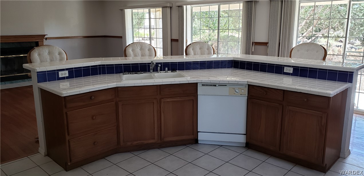 10002 East Blake Ranch Road, Unit 3 Kingman, AZ 86401 - Photo 10 of 42 a kitchen with a sink and cabinets