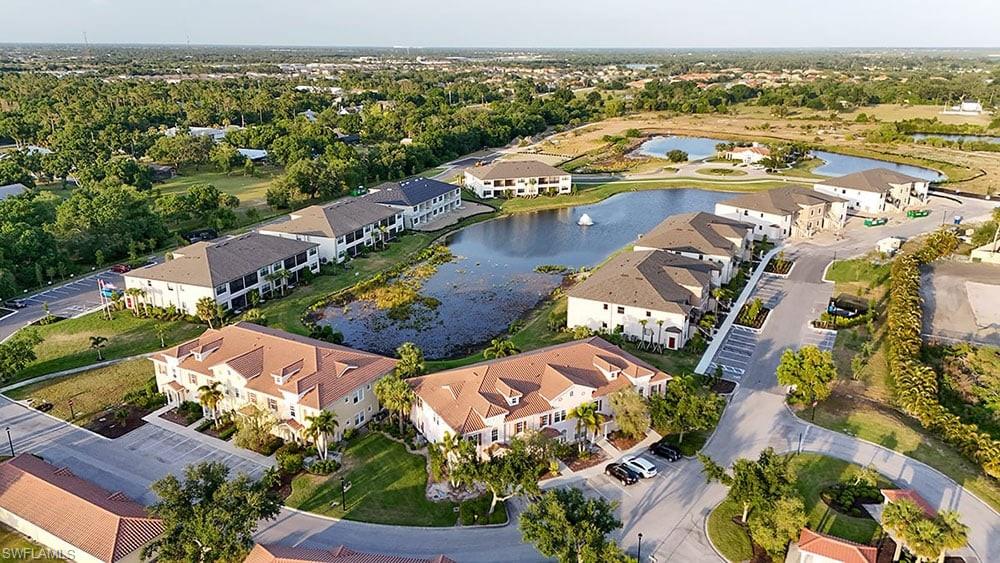 23955 Collina Way, Unit 104 Punta Gorda, FL 33980 - Photo 27 of 45 an aerial view of residential houses with outdoor space