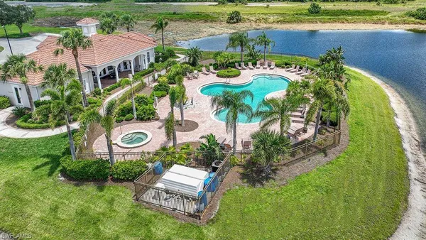 an aerial view of a house with outdoor space