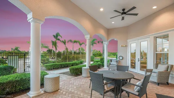 a house with swimming pool in front of it