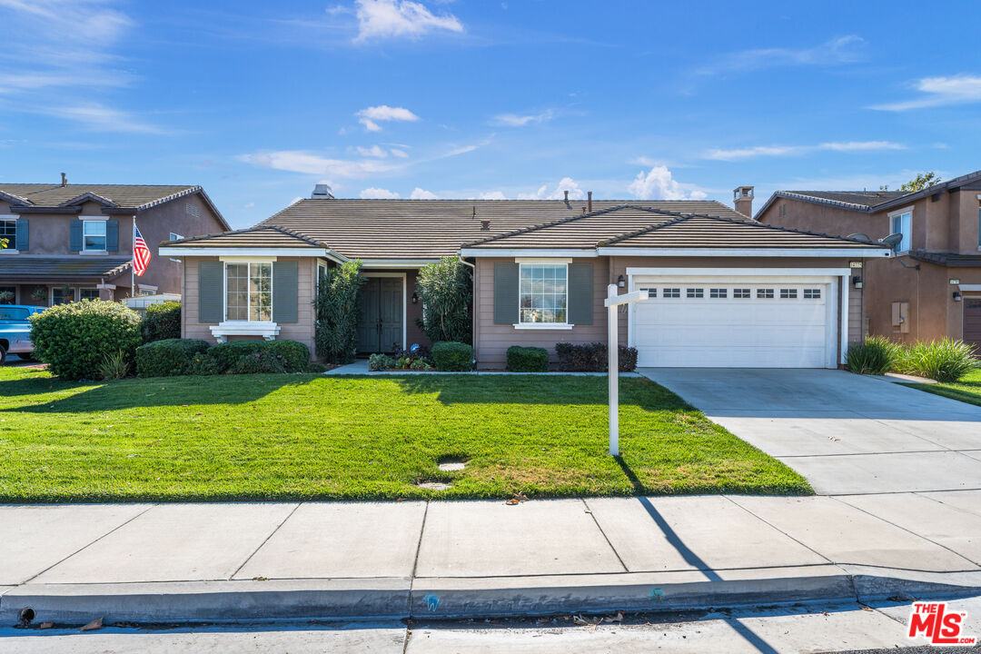 14775 Prairie Smoke Road Eastvale, CA 92880 - Photo 1 of 36 a view of a house with a backyard