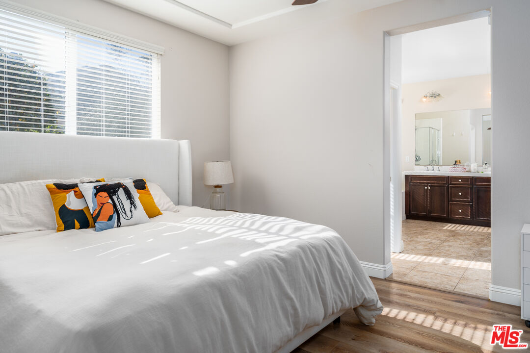 14775 Prairie Smoke Road Eastvale, CA 92880 - Photo 15 of 36 a bedroom with a bed and a dresser
