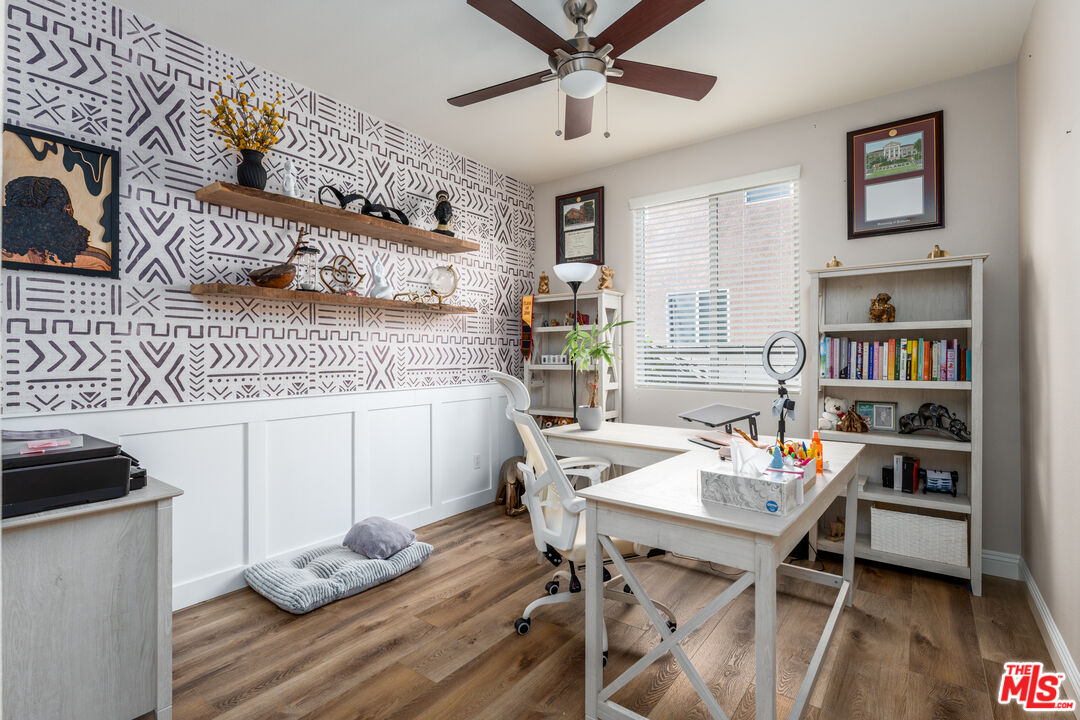 14775 Prairie Smoke Road Eastvale, CA 92880 - Photo 21 of 36 a view of a dining room with furniture and wooden floor